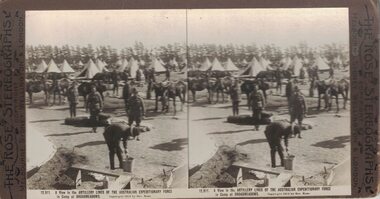 Soldiers and tents at a military camp.