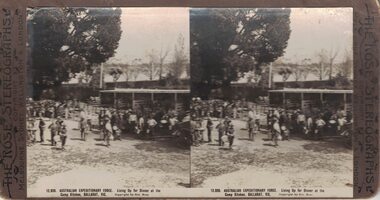 Soldiers at a camp kitchen.