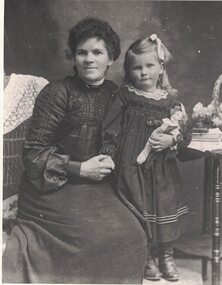 Portrait of a woman and a child.