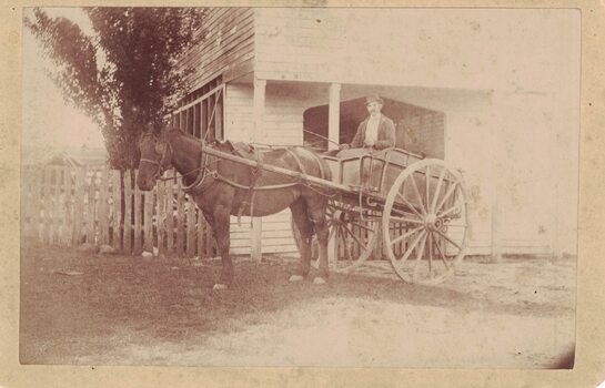 Man with a horse and cart.