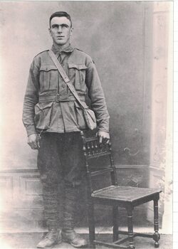 Portrait of a man in military uniform.