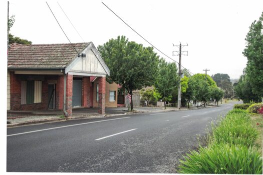 Image of a former garage building.