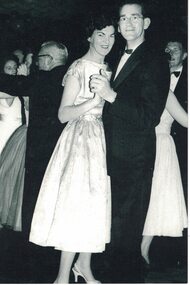 Man and woman dancing.