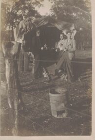 Three men and a wagon.