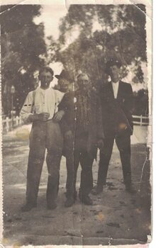 Image of four men.