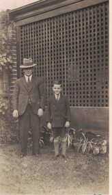 Image of a man and a young boy.