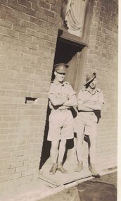 Image of two men in military uniform.