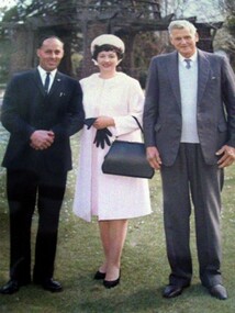 Image of two men and a woman.