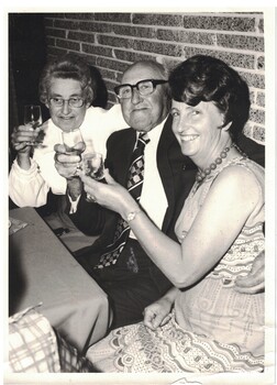 Three people at an event.