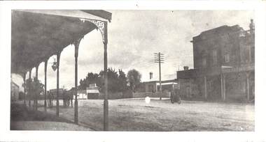 Photograph, Sussex Street, undated : Joseph Shepherd store and house, Criterion House, verandah of Railway Hotel