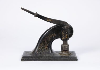 Metal press used to imprint Shire of Bacchus Marsh Seal on documents.