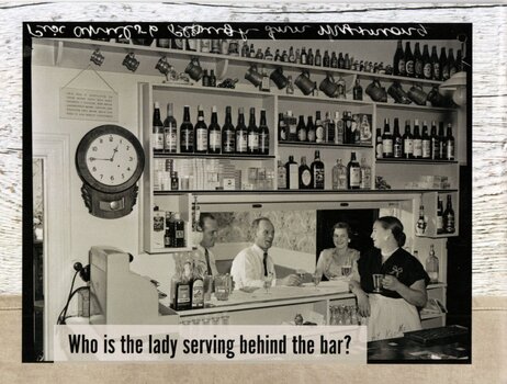 Who is the Lady serving behind the bar?
