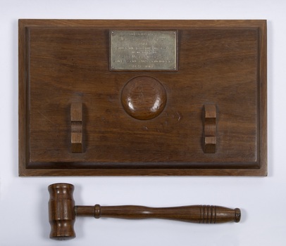 A hand made wooden gavel and sound block presented to Shire of Bacchus Marsh in memory of Alec William Bond. It was used by the Mayor to officiate at Council meetings.