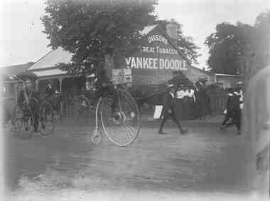 Photograph, Penny Farthings in street parade Bacchus Marsh ca 1900s