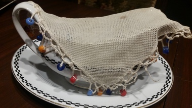 pair of beaded covers, sauce boat net crochet & beaded covers