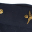 Navy blue epaulets with single gold button one end and crown, bird and three gold stripes the other.