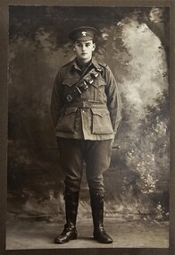 A young man dressed in the uniform of the Australian Imperial Forces