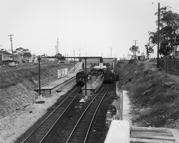 Two trains have pulled in to the newly completed below street level station