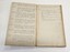 Internal pages of minute book with handwritten meeting minutes.