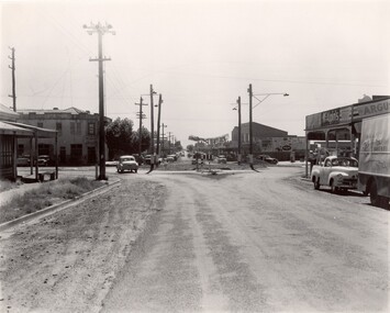 Rough roads with potholes and wide gravel shoulders running through Bentleigh East
