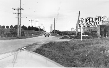 A truck travelling south along Warrigal Road toward the intersection with Centre Road, Oakleigh