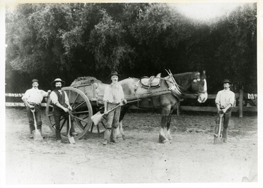 Four men with shovels stand in front of a horse and cart, preparing the land for a sporting field