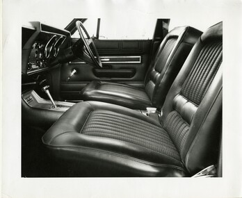 Car interior showing car seats and trim in detail. 