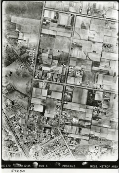 Aerial photograph showing roads, houses and fields