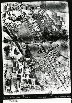 Aerial photograph showing fields, roads and properties