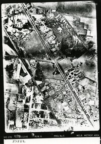 Aerial photograph showing fields, roads and properties
