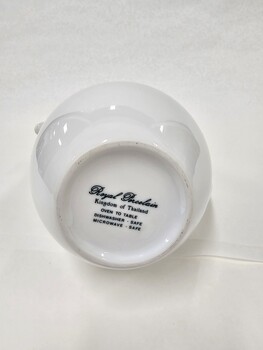 Image of base of coffee pot with makers mark