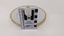 White bread and butter plate with gold edging and City of Moorabbin logo with scale to 8cm placed against centre