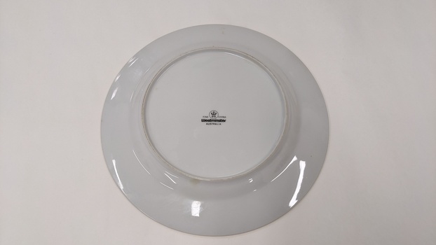 Base of white entree plate 