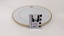 White dinner plate with gold edging and City of Moorabbin logo with scale to 8cm placed against right-hand side