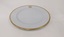 White dinner plate with gold edging and City of Moorabbin logo 