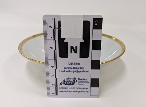 White soup bowl with gold edging and City of Moorabbin logo with scale to 8cm placed against centre