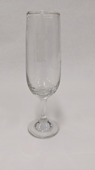 Glass champagne flute with white Kingston Arts logo printed on it
