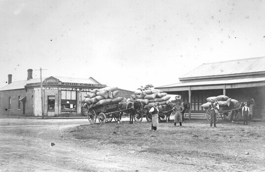 Loaded wagons across the road from Judd's shop