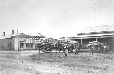 Loaded wagons across the road from Judd's shop