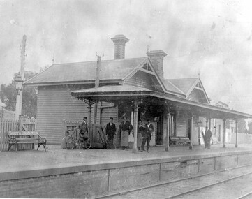 Six men standing on the platform at Moorabbin Railway Station