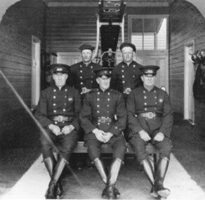 A group of five firefighters at Cheltenham Fire Station