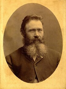 Head and shoulders portrait of Norman McSwain