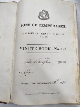 Printed fly sheet inside the minute book which has handwritten annotations