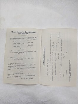 Inside pages of advertising brochure outlining contributions and benefits