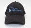 Peaked cap bearing a blue and white Falls Creek advertising logo