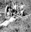 Group of skiers relaxing on the mountain out of ski season