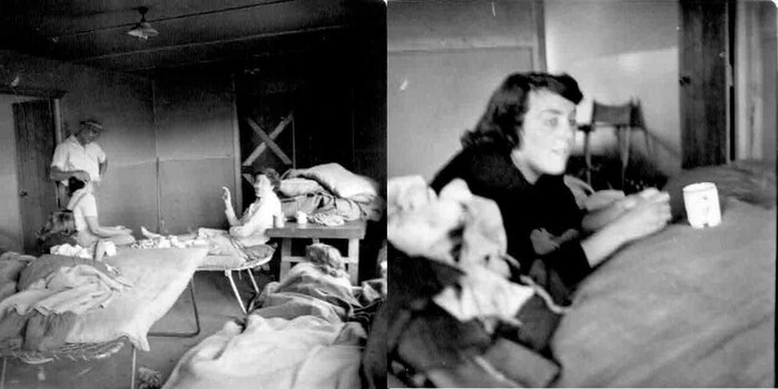 Unknown women relaxing on camp stretchers after the working bee.