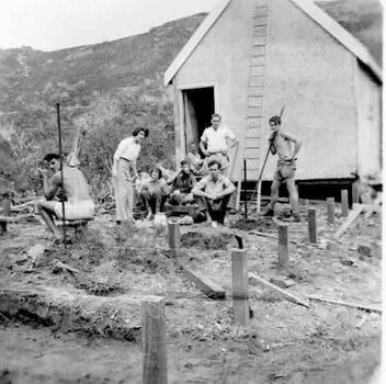 A group taking a tea break at the front of the lodge