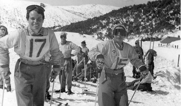 Group of competitors with two facing the camera wearing race numbers 15 and 17