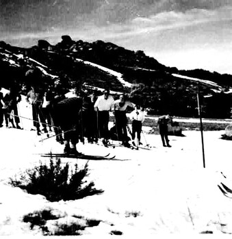 A group of friends gathered on the slopes